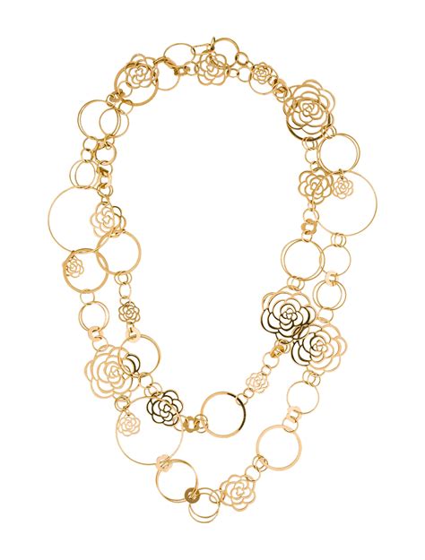 chanel camellia brooch cosmic|Chanel camellia flower necklace.